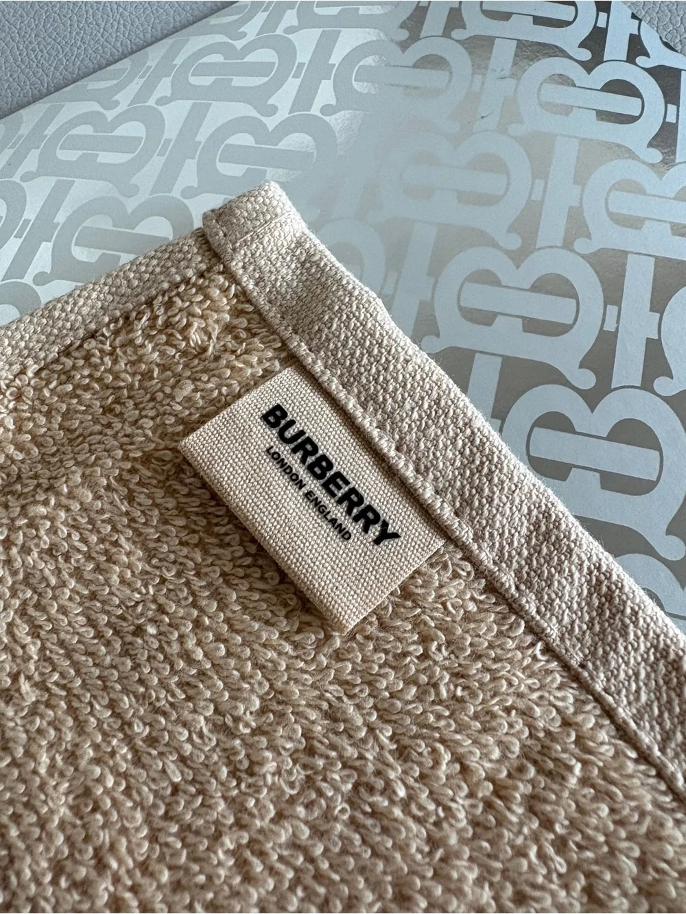 Burberry Beige Embossed Monogram Wash Cloth